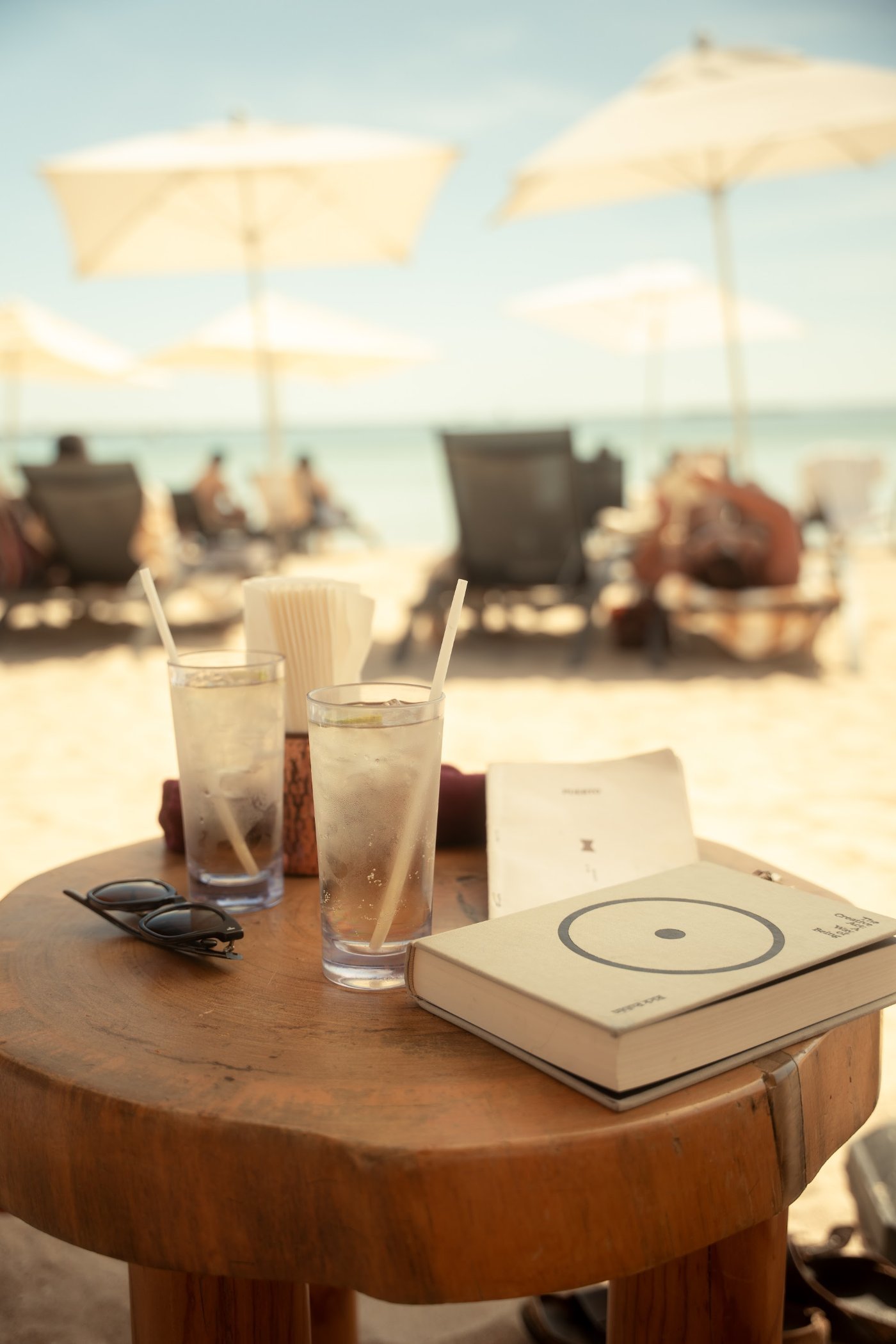 Drinks and a book at the beach club