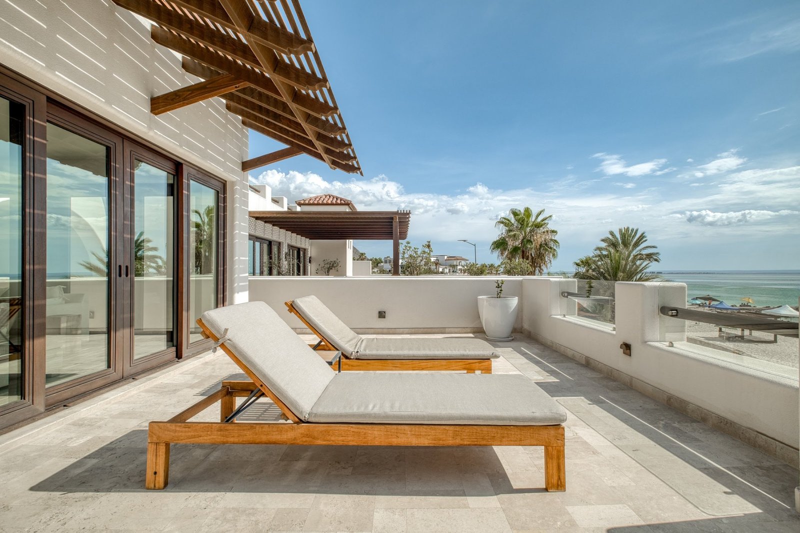 Terrace with loungers and ocean views